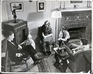 Quality Time Prints: Family Seated in Living Room Around Radio