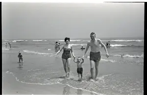 Beachgoer Prints: Family Walking on the Beach