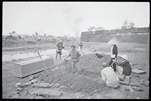 Family Watching Grave Diggers