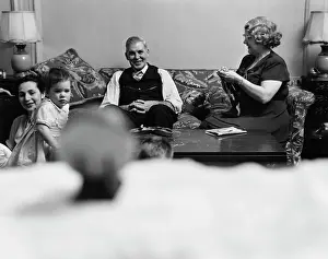 Tv Broadcasting Prints: Family Watching TV