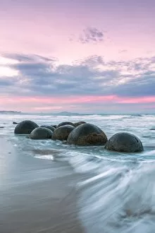 Surf Gallery: Famous Moeraki boulders at sunset, New Zealand