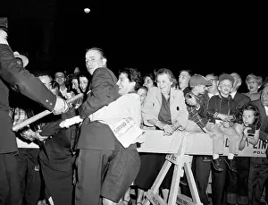 Barricade Prints: Fan Hugs Dodger Player Peewee Reese After Championship Win