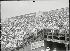 Prints of (Original Caption). Boys Play for City Basketball Championship Hoops Through Time: A Visual Journey of Basketball History: Fans Cheering at Baseball Game