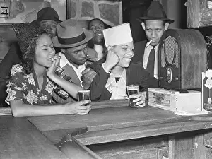 Harlem Prints: Fans Listening to Boxing Match over Radio