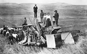 Pulling Prints: Farming Family Standing on Horse Drawn Harvesting Vehicle