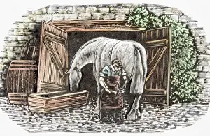Countryside Prints: Farrier shoeing horse drinking water from trough near open stable doors, rear view