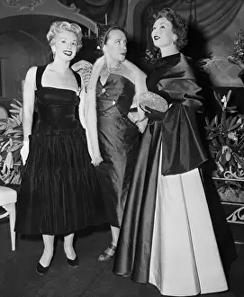 Fashion Designer Mademoiselle Schiaparelli Conversing at Party