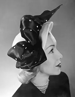 Stylish Prints: Fashion Model Wearing Cloche Hat by Claude Saint-Cyr