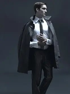 Thoughtful Prints: Fashion shot of a man in a suit and jacket