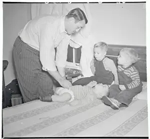 Fatherhood Prints: Father Changing Diapers