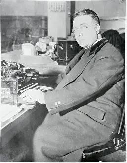 Father Coughlin Preparing a Speech on His Typewriter
