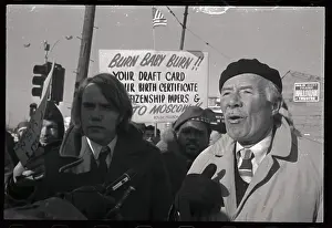 Father and Son Protesting at an Anti-Draft Rally