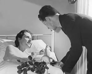 Visit Prints: Father Visiting his Wife & their Newborn Baby in Hospital Bed