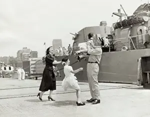 Fatherhood Prints: Father Being Welcomed Home from Navy by Family