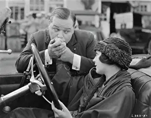 Intimacy Prints: Fatty Arbuckle Kissing Woman's Hand