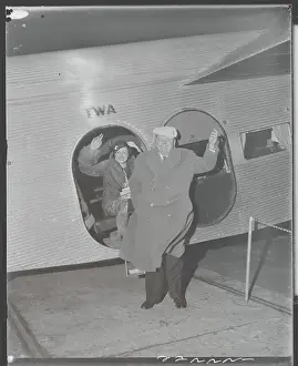Fatty Arbuckle and Wife Waving Goodbye