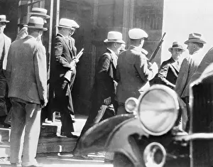 Federal Agents Escorting Gang Members