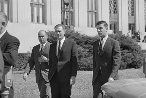 Meridian Prints: Federal Agents Escorting a Trial Witness