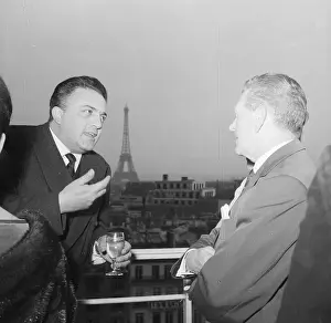 Federico Fellini on Terrace with Eiffel Tower View