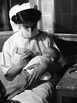 Roles And Occu Prints: Feeding Baby