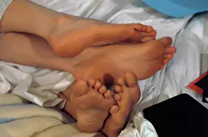 Feet of John Lennon and Yoko Ono in Bed