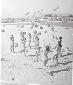 Long Beach Prints: Female Archers Targeting Balloons