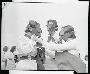 Three Female Army Nurses Adjusting Their Gas Masks