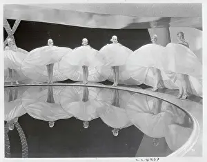 Elegance in Motion: A Ballet Journey: Female Dancers in Reflective Dance Scene
