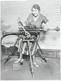 Seattle Prints: Female Engineering Student with Machinery