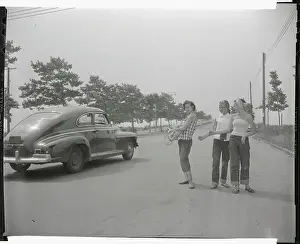 Female Hitchhikers Receiving a Ride