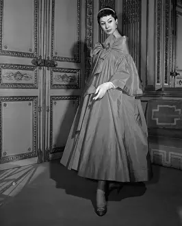 Female Model Posing in Elegant Long Overcoat