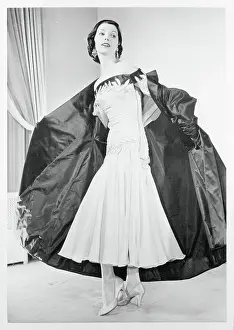 Female Model Wearing Dress With Long Jacket