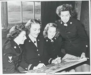 Female Officers Reviewing a Map