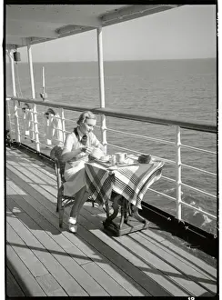 Female Passenger Having Tea Alone on Cruise Ship