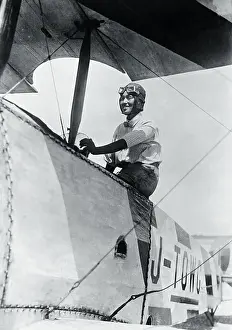 Air Force Prints: Female Pilot Posing in Her Airplane