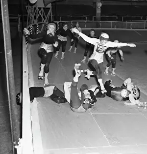 Photographic Study Prints: Female Roller Skaters Jumping over Less Fortunate Racers
