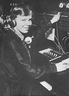 Female switchboard operator, portrait (B&W)