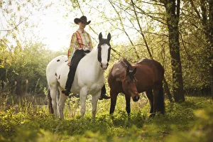 Equestrian Event Collection: Female western rider on a Paint Horse, Black Tobiano colour pattern