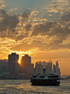 Ferry in Hong Kong with sunset ambiance