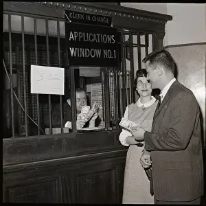 Paying Prints: Fiances Pay Marriage License Fee at Window