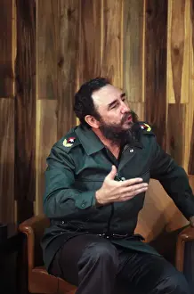 Fidel Castro Gesturing While Sitting and Talking