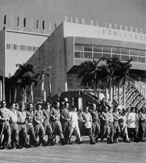 Fidel Castro Marching with Political Leaders