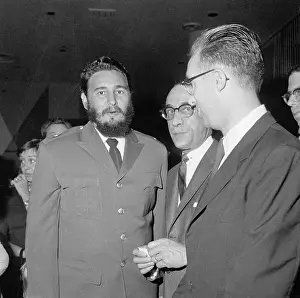 Fidel Castro Posing With Others at Banquet Occasion