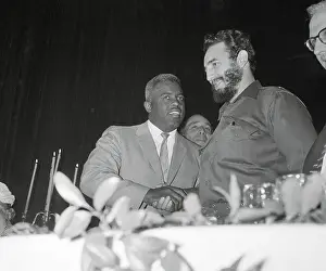 Fidel Castro Shaking Hands with Jackie Robinson