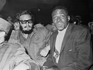 Fidel Castro Sitting Next to Baseball Player Minnie Minoso