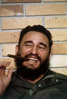 Fidel Castro Smiling and With Cigar in His Mouth