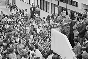 Fidel Castro Speaking at Podium to Large Crowd