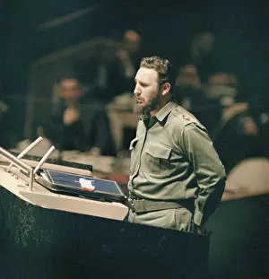 Fidel Castro Standing at Podium With Hands Behind His Back