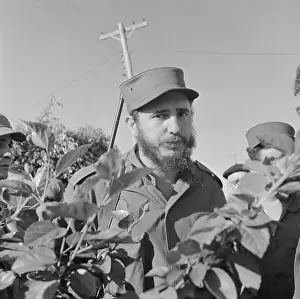 Fidel Castro Walking Through Field