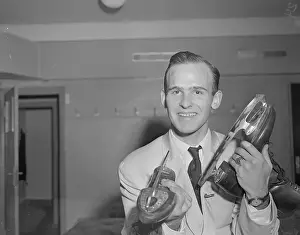 Oslo Prints: Figure Skater Dick Button Holding Skates
